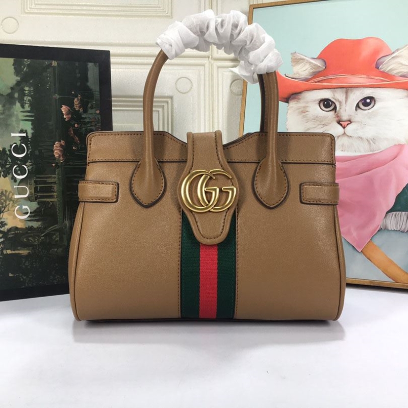 G*u*i shopping bags